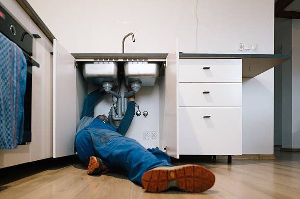 Professional Emergency Plumber technician working in Woodstown, NJ
